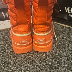 Sorel Orange Winter Rain Boots Sleek Design